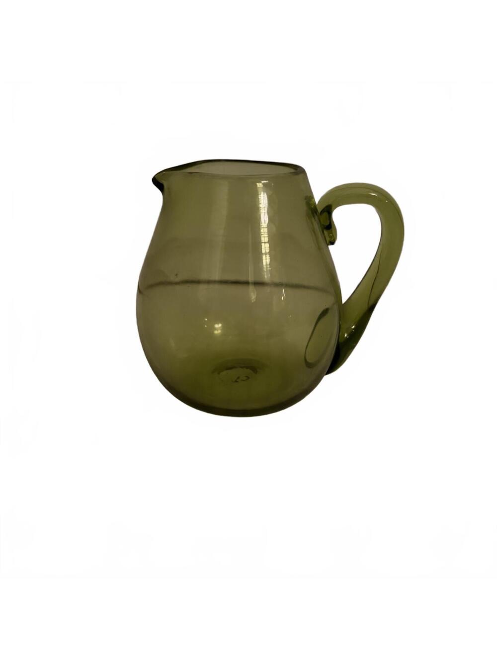 Vintage hand-blown green glass creamer pitcher from Jamestown, Virginia.